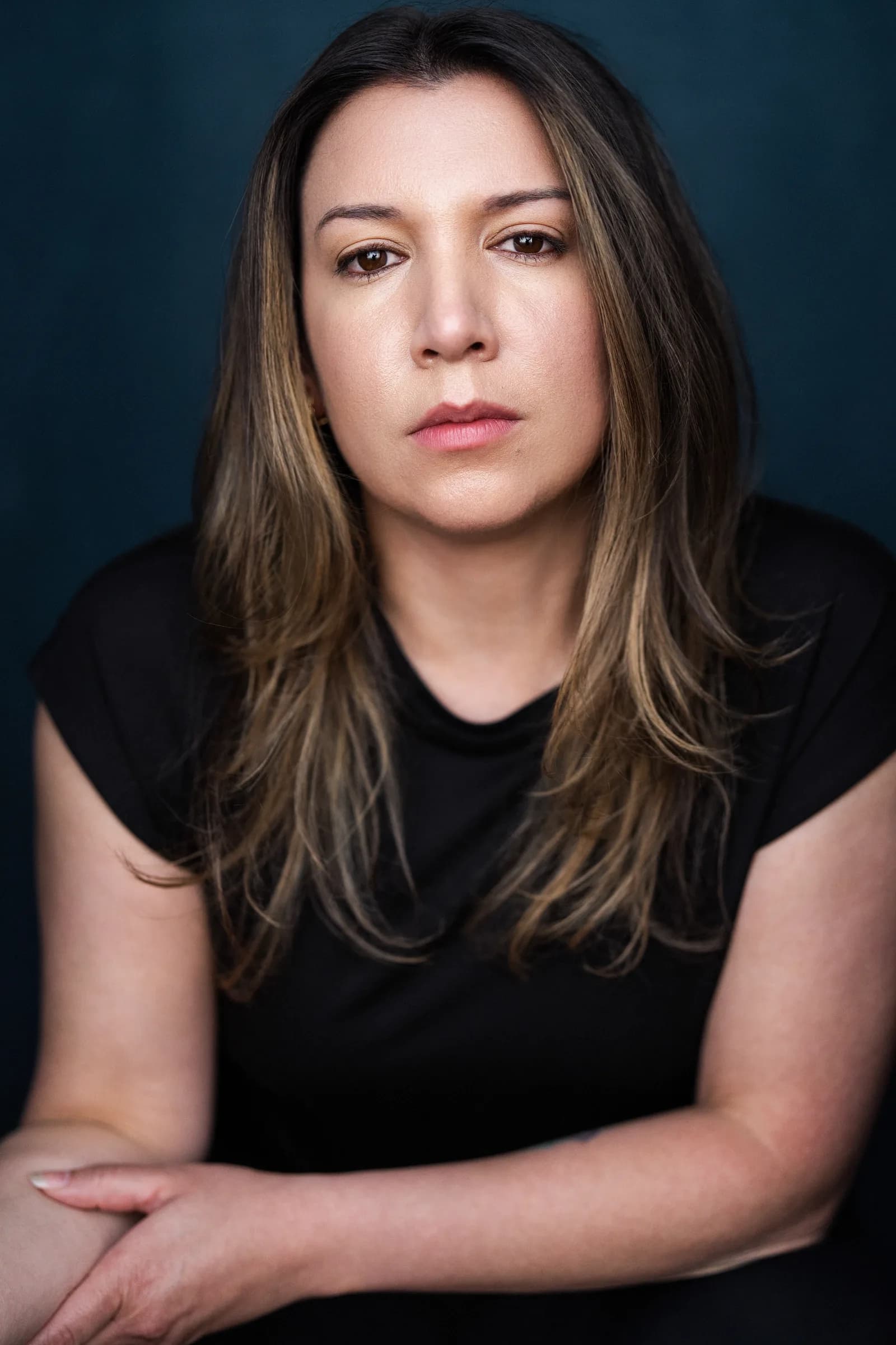 DeAnna Powell dramatic headshot, arms crossed