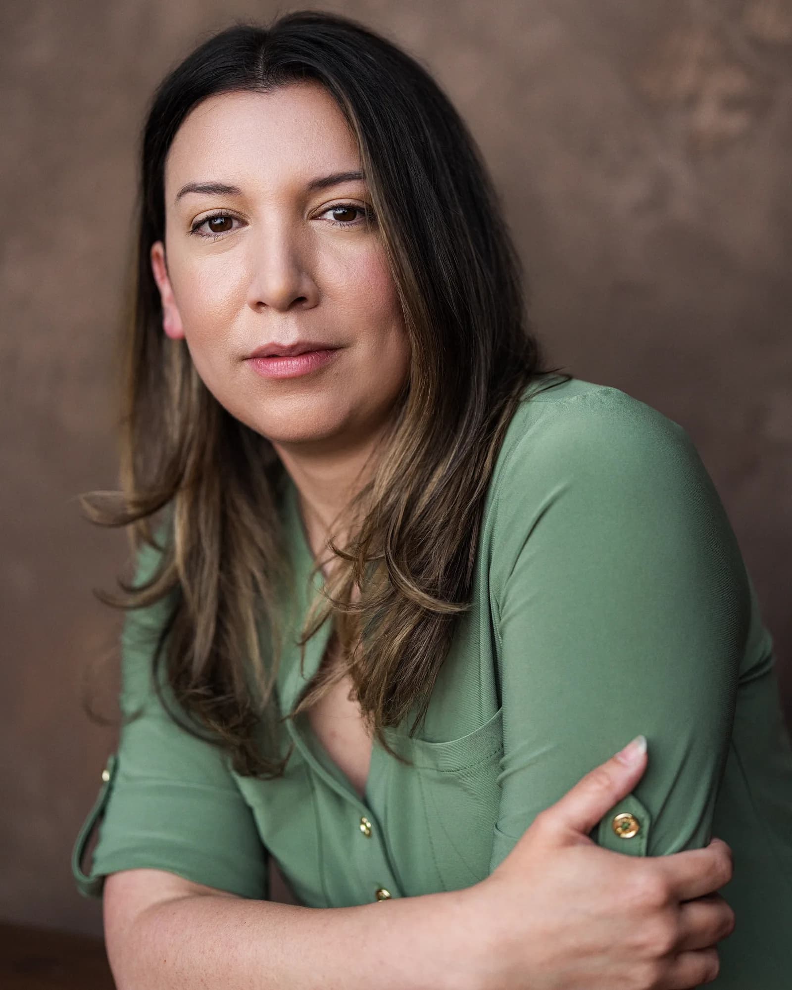 DeAnna Powell headshot, sage green